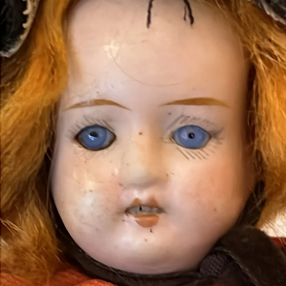 Antique bisque doll with carved wood body open mouth glass eyes marked red hair